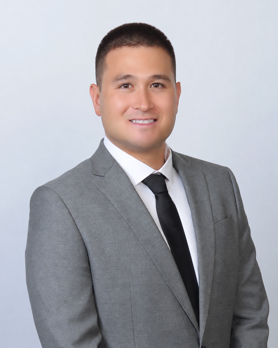 HR Group team member in a gray suit